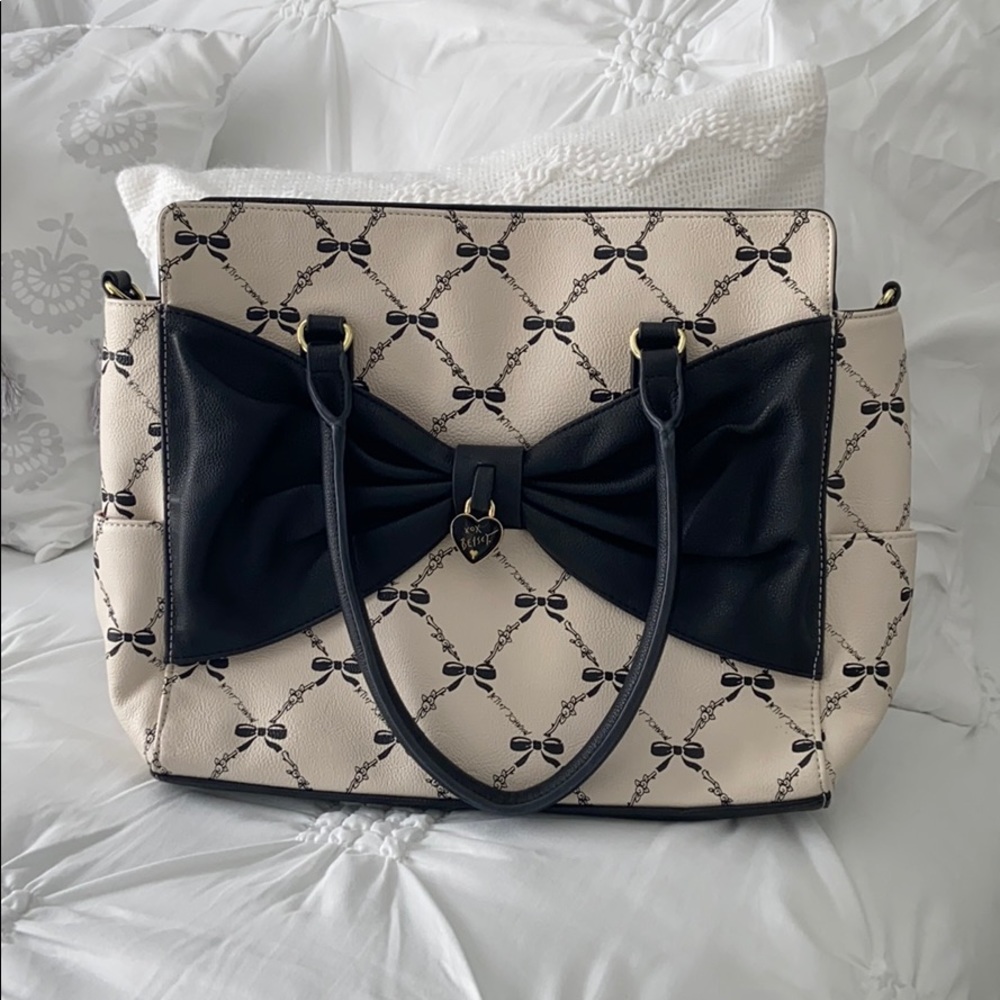 Betsy Johnson beige and black bow purse